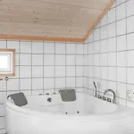 Three-bedroom In Hébergement de vacances